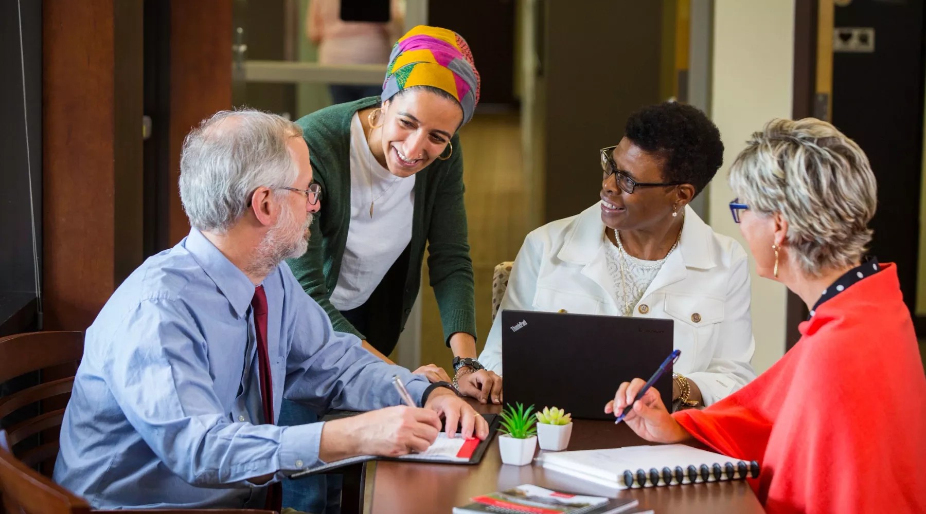 SPHIS faculty and staff advising a student