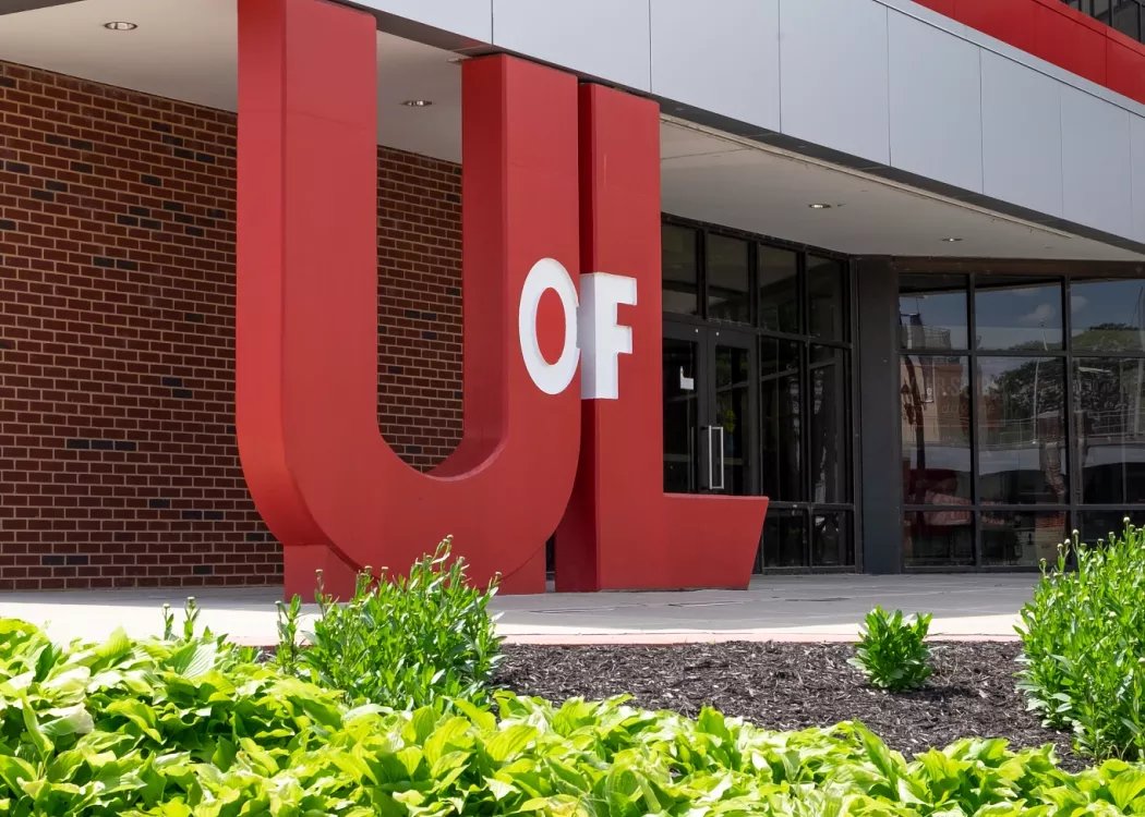 Exterior of the Student Activities Center, the UofL monogram as an architectural detail