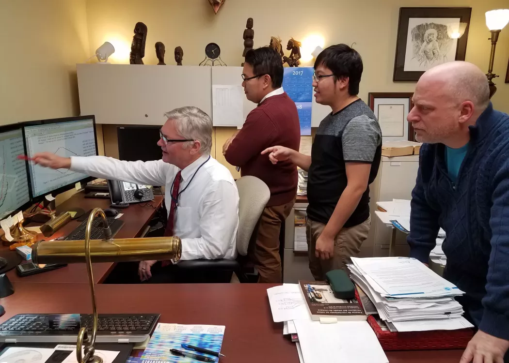 Researchers analyzing data