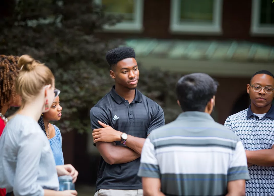 SPHIS students talking on Belknap Campus
